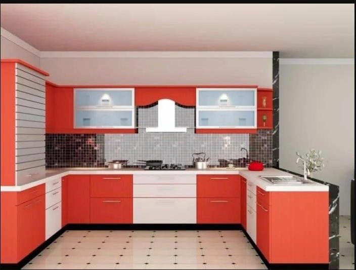 Orange and white U-shape modular kitchen with mosaic tile backsplash